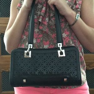 Black Leather Handbag by Stuart Wietzman